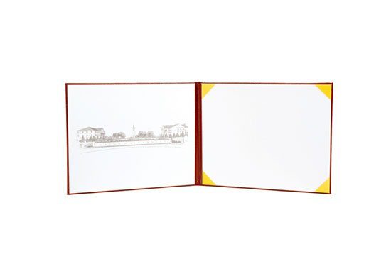 A photo album with a picture of a train on the back.