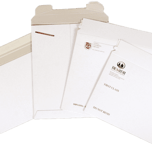 A group of white envelopes sitting on top of each other.