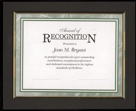 A recognition certificate is displayed in a frame.